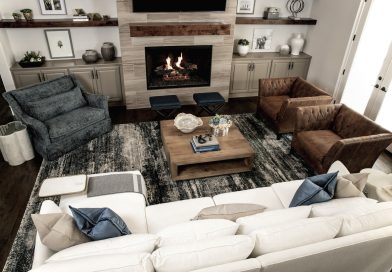 A beautiful modern home interior provides a stunning and relaxing living space complete with a modern fireplace and stylish furniture.